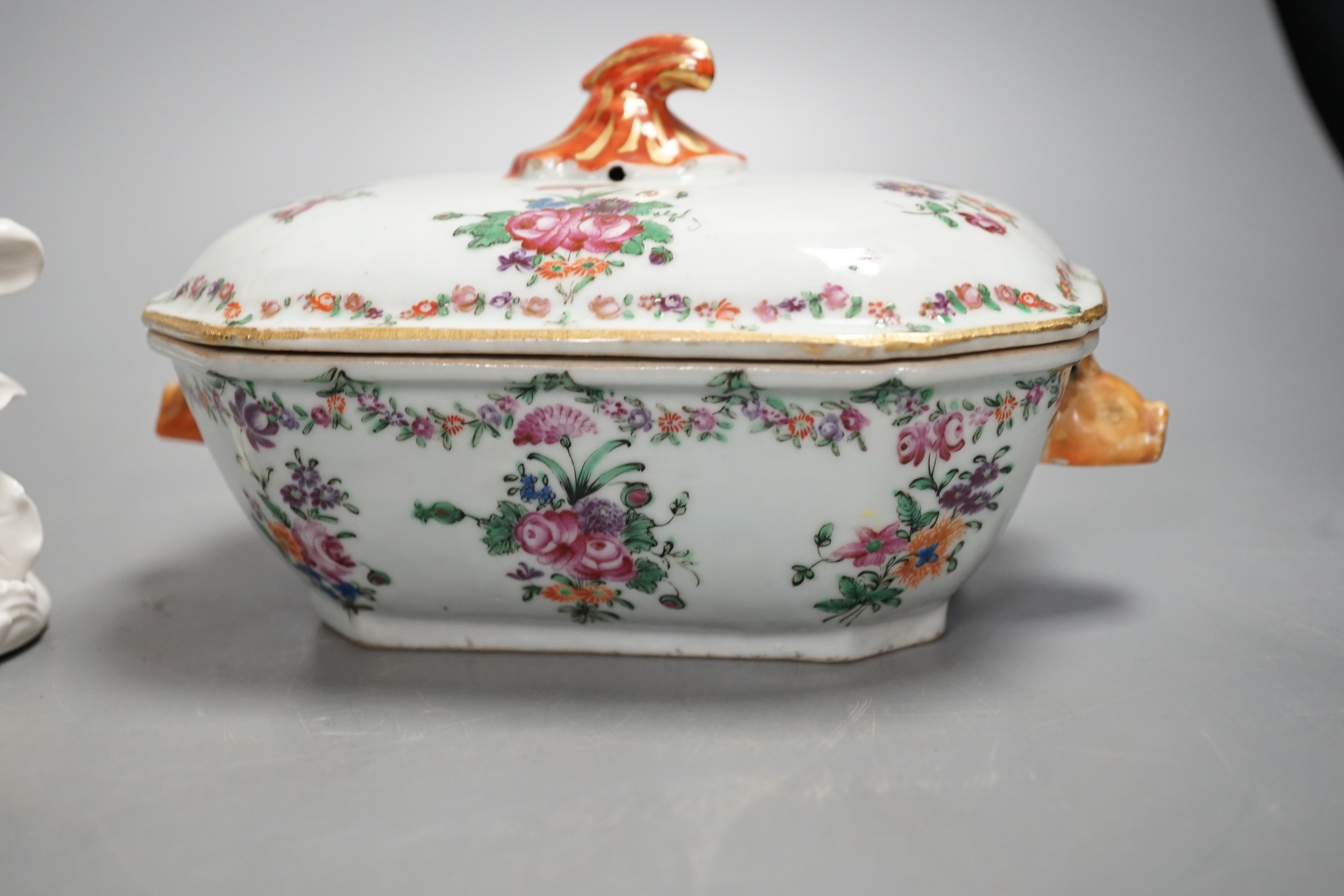 An 18th century Chinese lidded porcelain tureen and a pair of blanc de chine figures 18cm